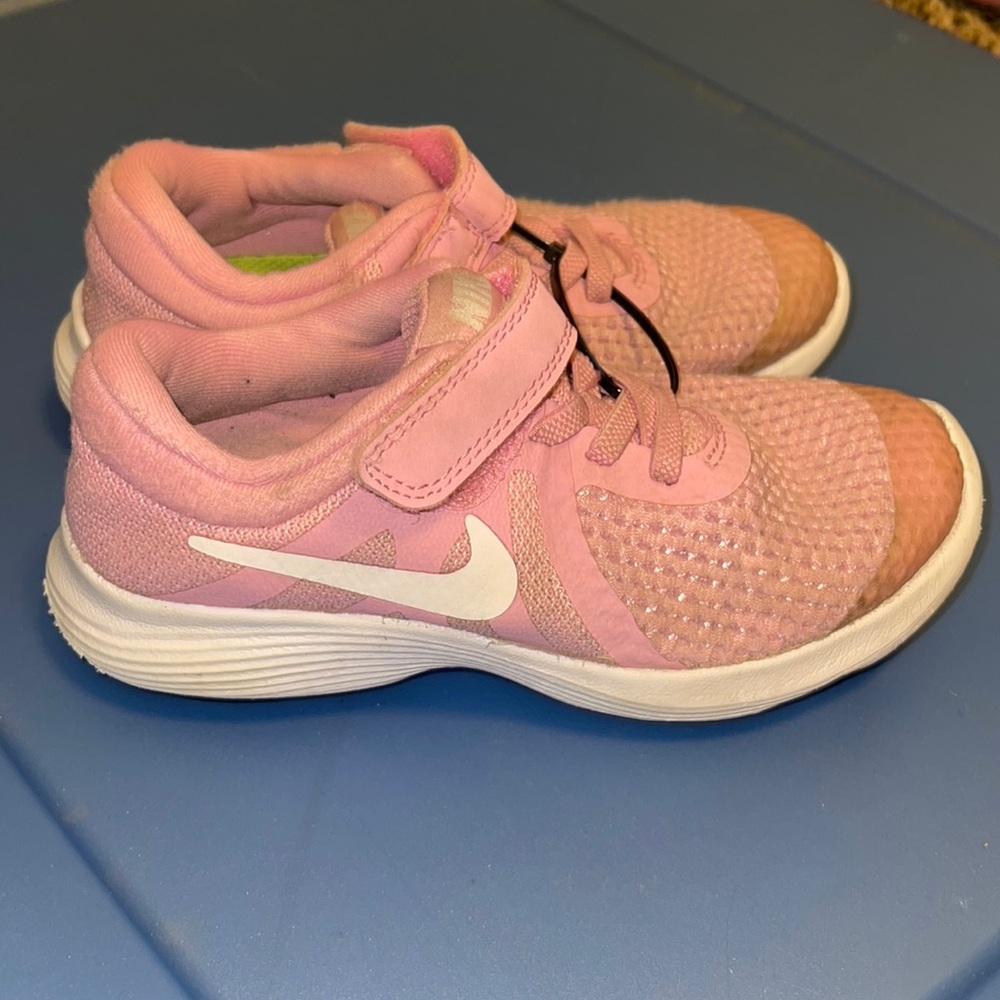 Girls size 11 pink Nike running shoes